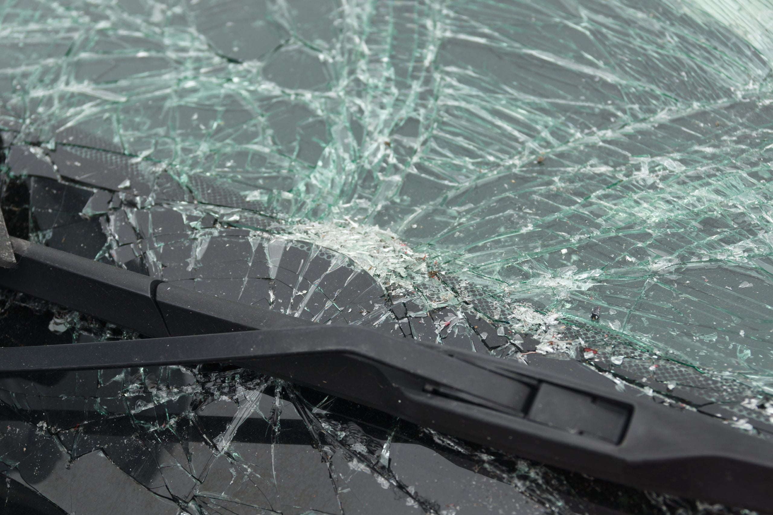 Smashed windscreen Smashed windscreen or windshield on a car in close up ideal for vehicle insurance claim or vandalism concepts